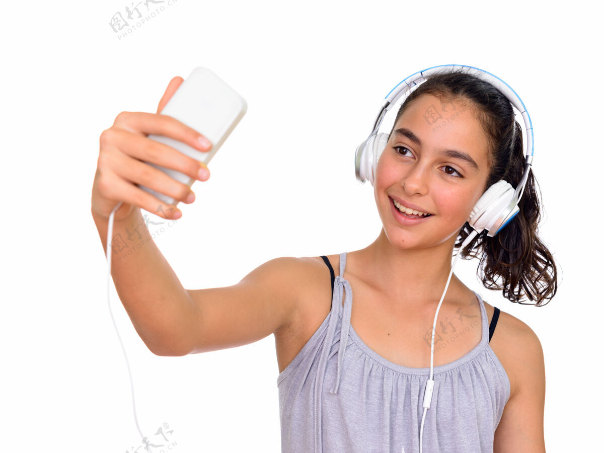 青少年年轻漂亮的少女穿着无袖连衣裙与白色空间隔离虚拟博客技术深色头发