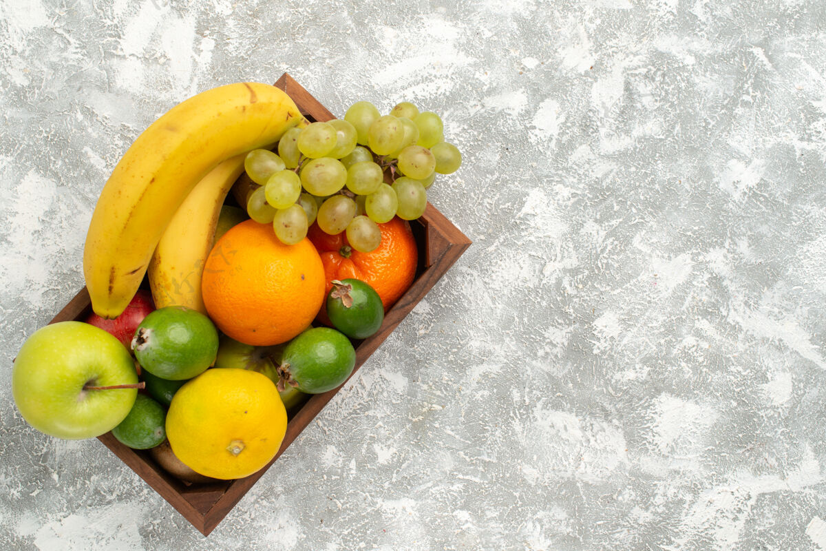 柠檬顶视图新鲜水果组成香蕉 葡萄 白底飞珠 水果醇厚 维生素健康 新鲜农产品柑橘生的