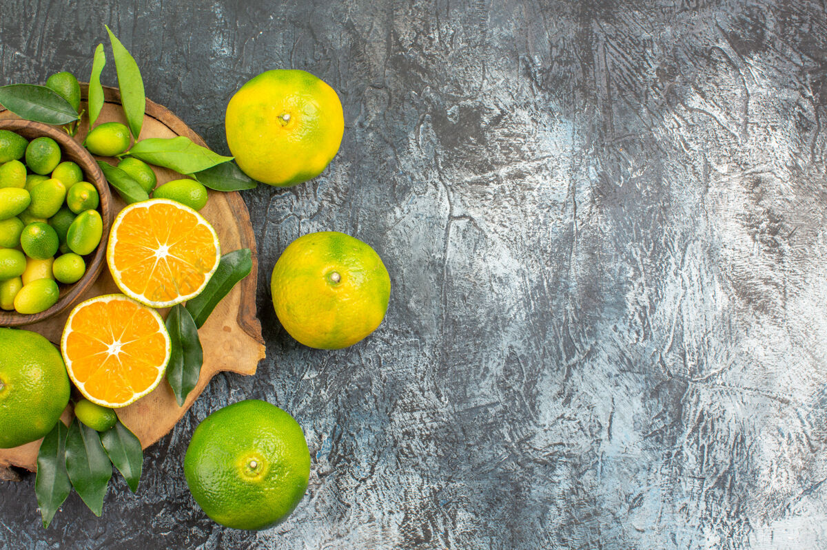 顶视图顶部特写查看柑橘类水果不同种类的柑橘类水果在木板上水果食物苹果