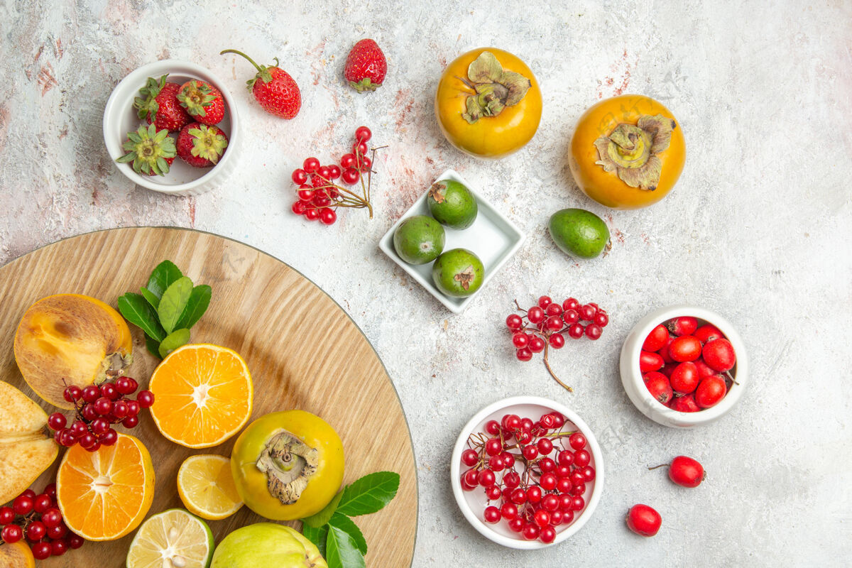 饮食顶视水果组成不同的水果上白色的表色浆果新鲜成熟浆果晚餐水果组成