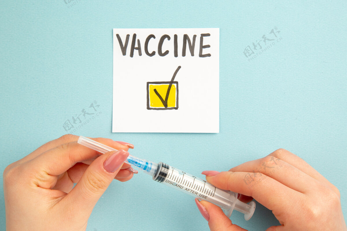 仪器俯视图蓝色背景上女性写的疫苗说明疫苗颜色实验室大流行医院科学冠状病毒-病毒健康笔女性医院