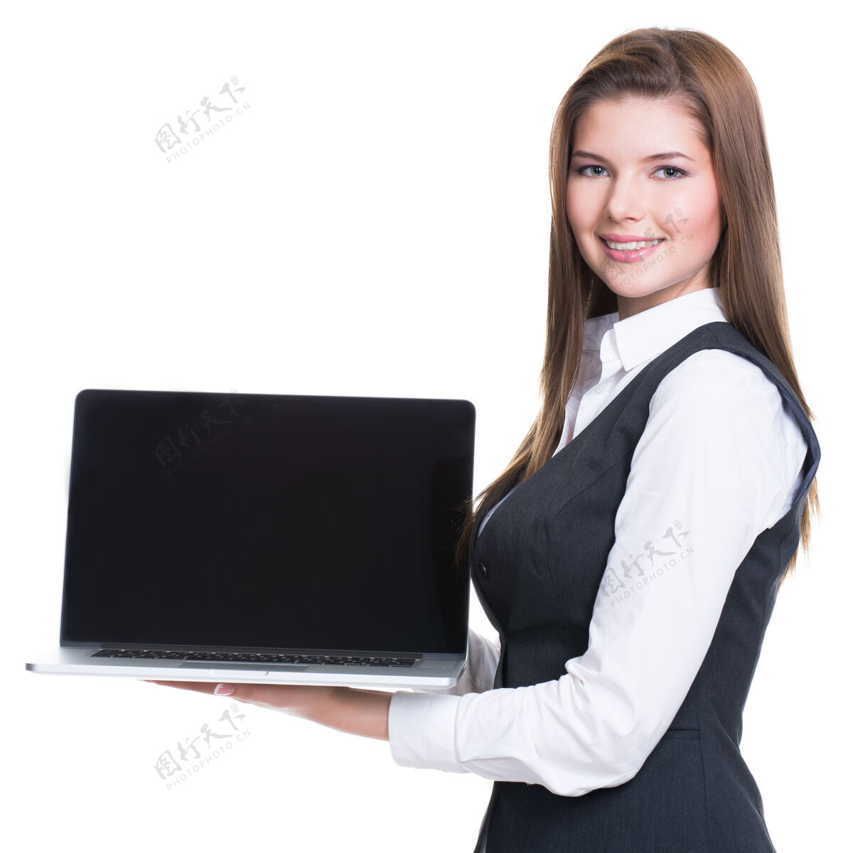 吸引力成功的年轻女商人拿着笔记本电脑-隔离在白色上电脑女性沟通